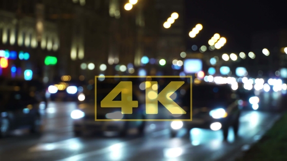 Night City Lights. Reflection Of Car Headlights On The Road. Traffic Jam Blur