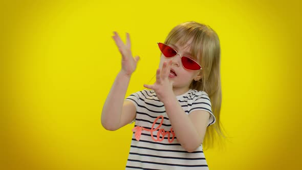 Little Teen Kid Child Girl in Sunglasses Listening Music Dancing Disco Fooling Around Having Fun