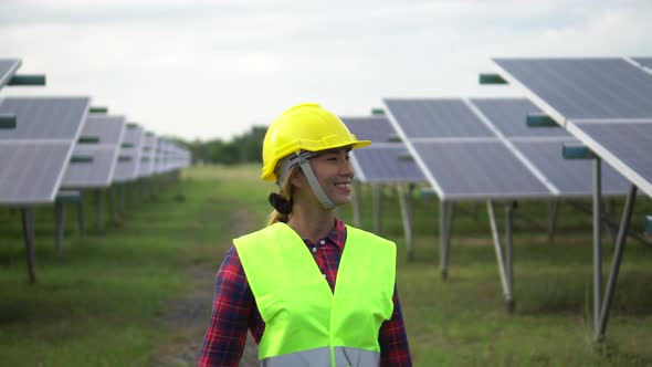 Aerial view of Engineering checking Solar cell Farm, Electricity production from the sun,