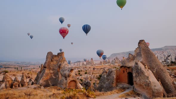 Timelapse of Flying Air Balloons Over Cappadocia Landscape at Sunrise