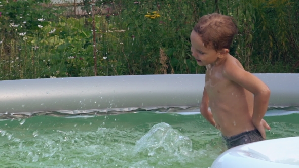 Caucasian Child Smiling And Laughing Outdoors.