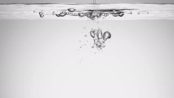 Bubbles in the Water in Slowmo