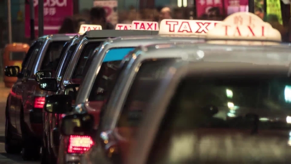 Taxi Cars Waiting For Clients In Night Hong Kong alt