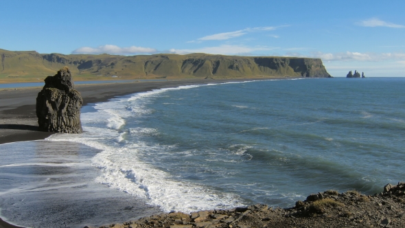 Picturesque Blue Ocean Waves Breaking Of Coast Near Arnardrangur Cliff