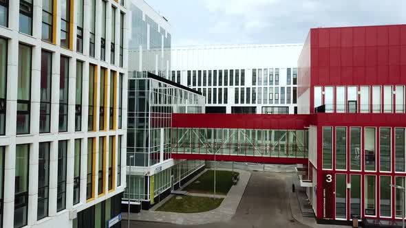 A Modern Hospital Zone with High Medical Buildings and Green Lawns