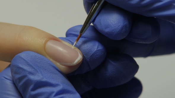 Manicurist Makes Girl French Manicure