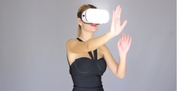 Beautiful Sexy Blond Girl Enjoys Virtual Reality Glasses
