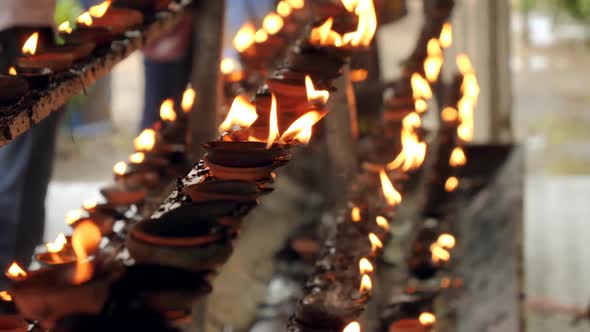Closeup  Video of Sacrad Flame on Burning Oil Lamps at Hindu Temple