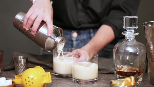 Step by step. Garnishing whiskey sour cocktail at home bar