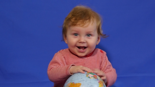 Toodler Playing With a Globe