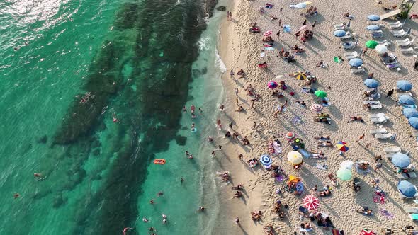 People swim in the azure sea aerial view 4 K Turkey Alanya