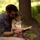 Single Parent Dad Teach Adorable Cute Preschool Child Girl. Kid With Father Reading Book. - VideoHive Item for Sale