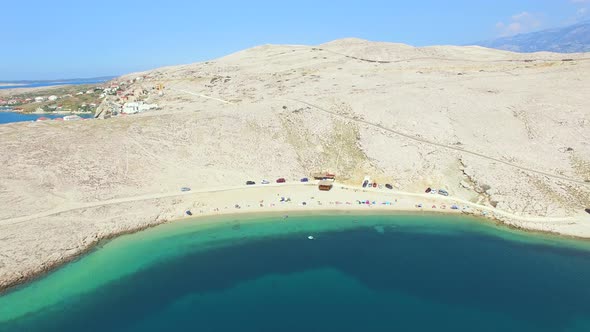 Flying above isolated beach of Pag island, Croatia