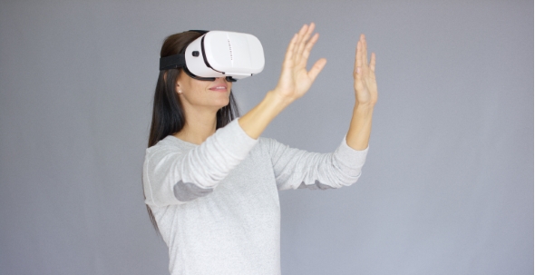 Adorable Woman Working With Virtual Reality Glasses