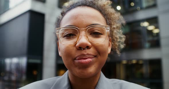 AfricanAmerican Businesswoman Turns Her Head and Looks at the Camera