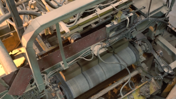 Top View Of Automated Machine Loads Bricks