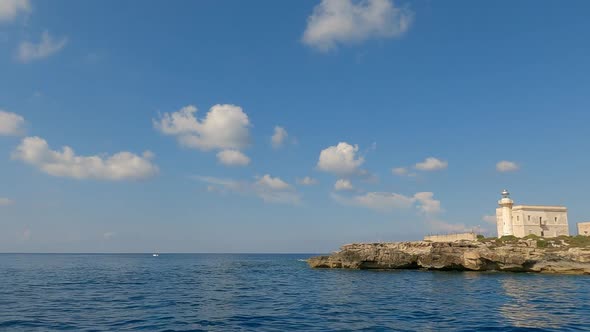 Punta Marsala lighthouse of Favignana island in Sicily seen from boat, Italy