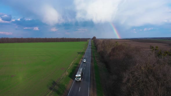 Rainbow Over Rural Highway Road Spring Landscape Aerial View