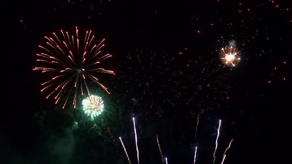 Colorful Firework display at night on sky background