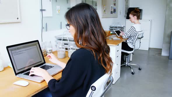 Business executive using laptop