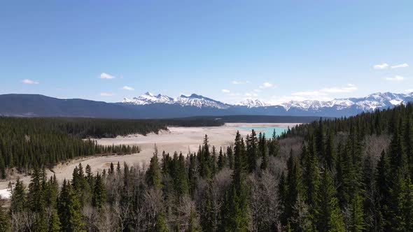 Abraham Lake In Spring With Snow Top Mountains