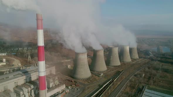 Aerial View of an Industrial Zone Pipes Pouring Thick White Smoke