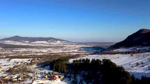 aerial view over private houses in wintertime.