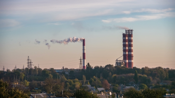 Smoke From Pipes Of The Industrial Plant In The City.