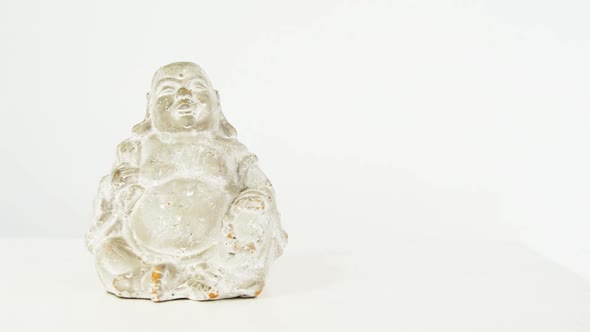 Close-up of crystal laughing buddha