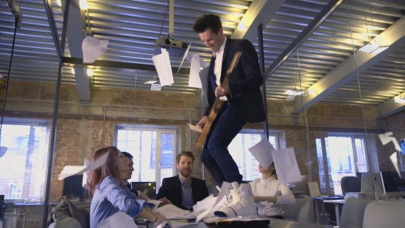 Happy Successful Business People In Office Having Fun Throwing Documents