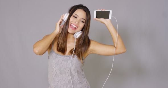 Woman Singing Along To Her Music