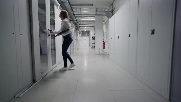 Woman entering to server room