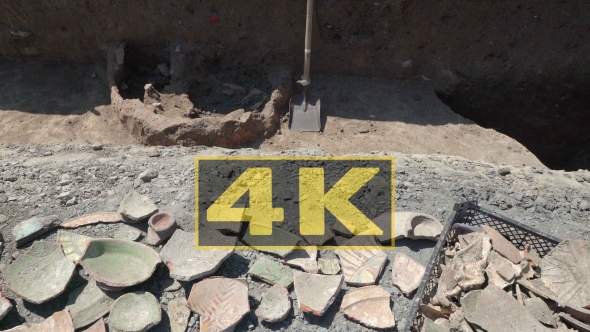 Shards Of Bowls On Display At The Edge Of The Archaeological Site. Dolly Right Left alt