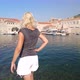 Woman in Old Medieval Port in Croatia - VideoHive Item for Sale