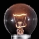 Edison Lamp Light Bulb Blinking Over Black Background - VideoHive Item for Sale