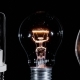 Set Of 3 Edison Lamps Blinking Over Black Background - VideoHive Item for Sale