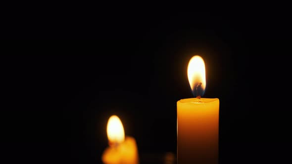 Candles Flame on Black Background