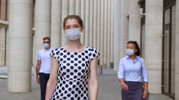 Slider Shot of Diverse Business People in Face Mask Commute to Work Downtown