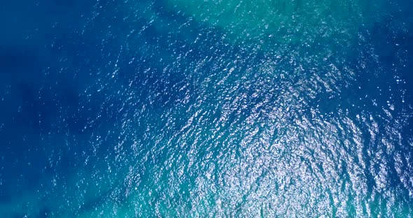 Natural aerial island view of a white paradise beach and turquoise sea background in best quality 4K