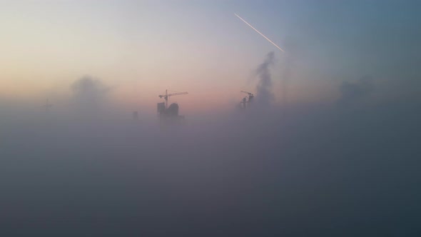 Aerial View of Cement Factory with High Concrete Plant Structure and Tower Crane at Industrial