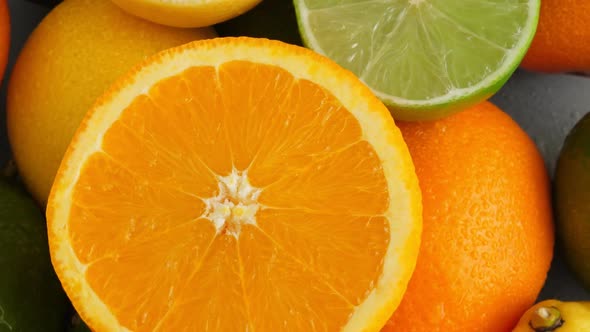 Sliced Juicy Orange, Lime and Limon on Citrus Fruit Background, Medicine and Food Concept