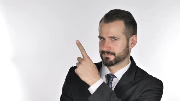 Beard Businessman Pointing on Side White Background