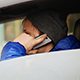 Man Talking on the Mobile Phone in Parked Car. View Through the Windshield. - VideoHive Item for Sale