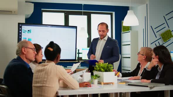 Manager Pointing on Digital Interactive Whiteboard with Growth Analysis