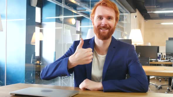 Thumbs Up by Man in Office, Red Hairs
