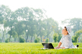 young man working in the park with a laptop - PhotoDune Item for Sale