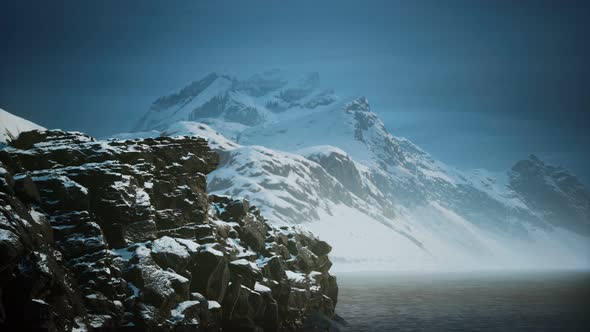 Snow Covered Mountains in Northern Ocean