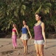 Women practicing yoga on a beach - VideoHive Item for Sale