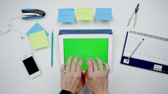Male Hands Typing Tablet with Greenscreen