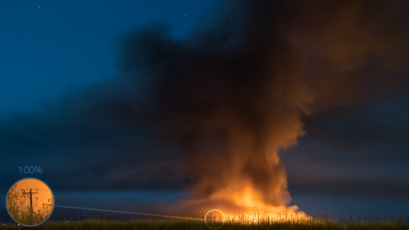 Huge Fire on a Field at Night